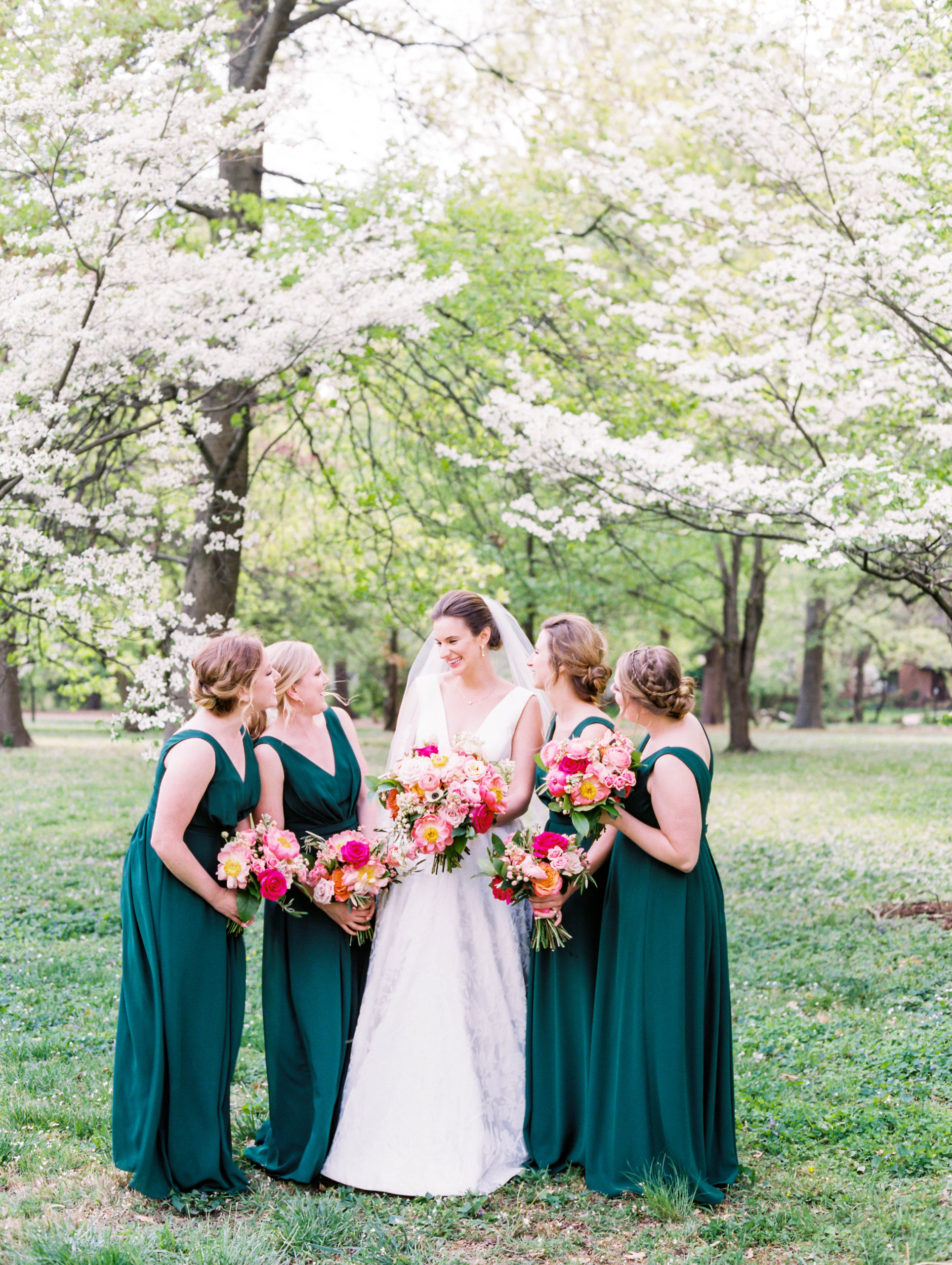 St Louis spring wedding with pink bouquets and green bridesmaid dresses