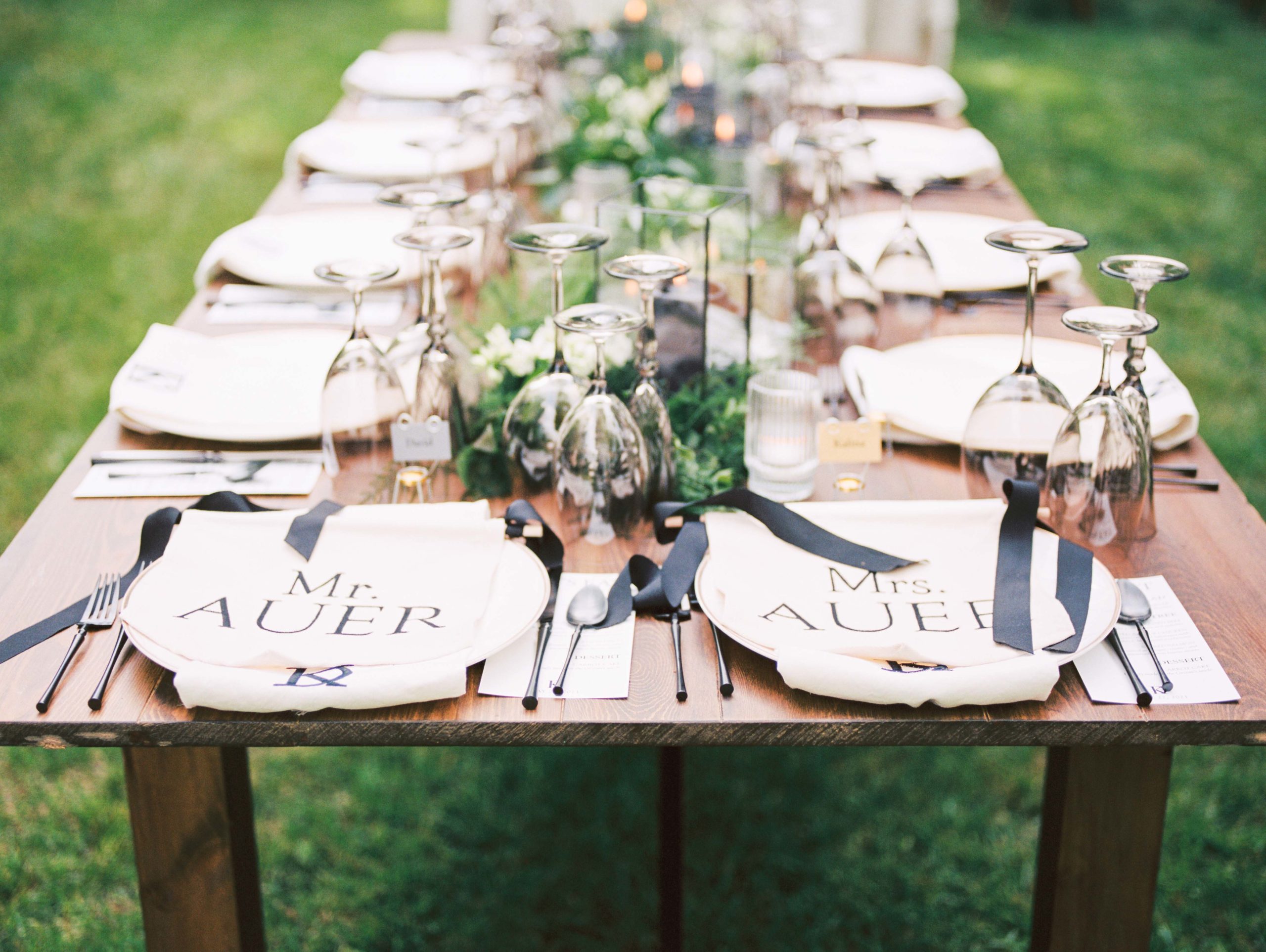 organic backyard wedding tablescape with black details